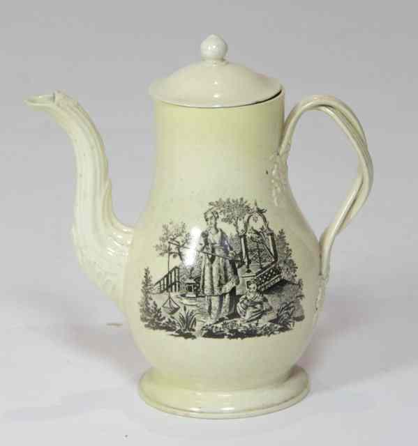 Appraisal: An th Century creamware pottery coffee pot and cover printed