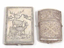 Appraisal: An Eastern silver filigree cigarette case together with an Eastern