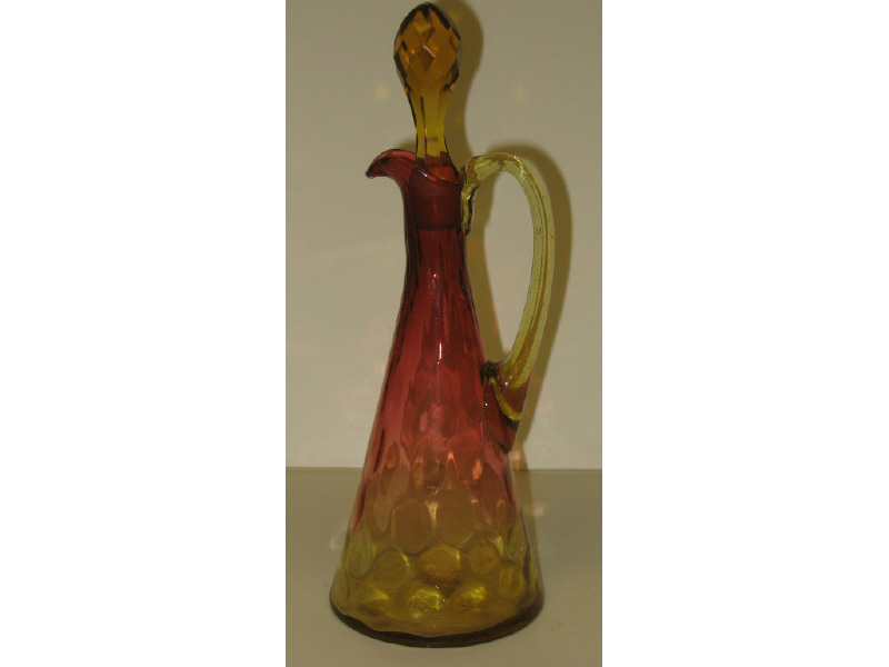 Appraisal: AMERICAN AMBERINA GLASS CRUET Coin spot pattern with applied handle