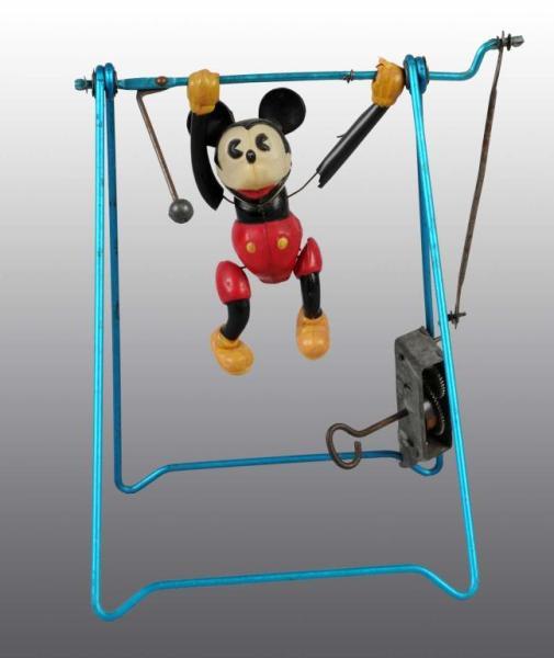 Appraisal: Celluloid Walt Disney Mickey Mouse Swing Toy Description Working Marked