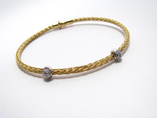 Appraisal: k yellow woven gold flexible bangle bracelet with two pave