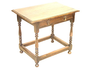 Appraisal: An oak side table th century the moulded top above