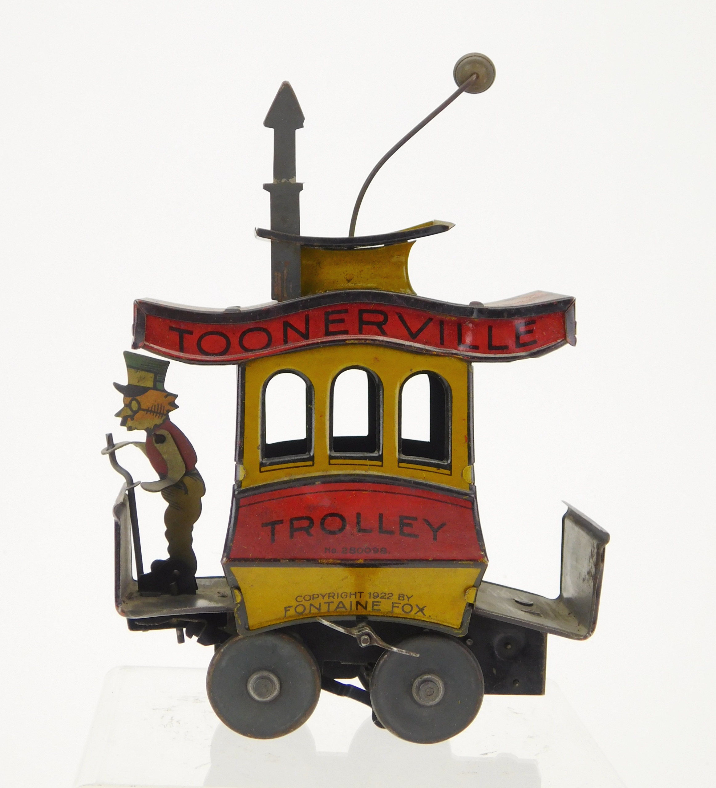 Appraisal: Fontaine Fox 'Toonerville Trolley' wind-up toy lithograph tin with key