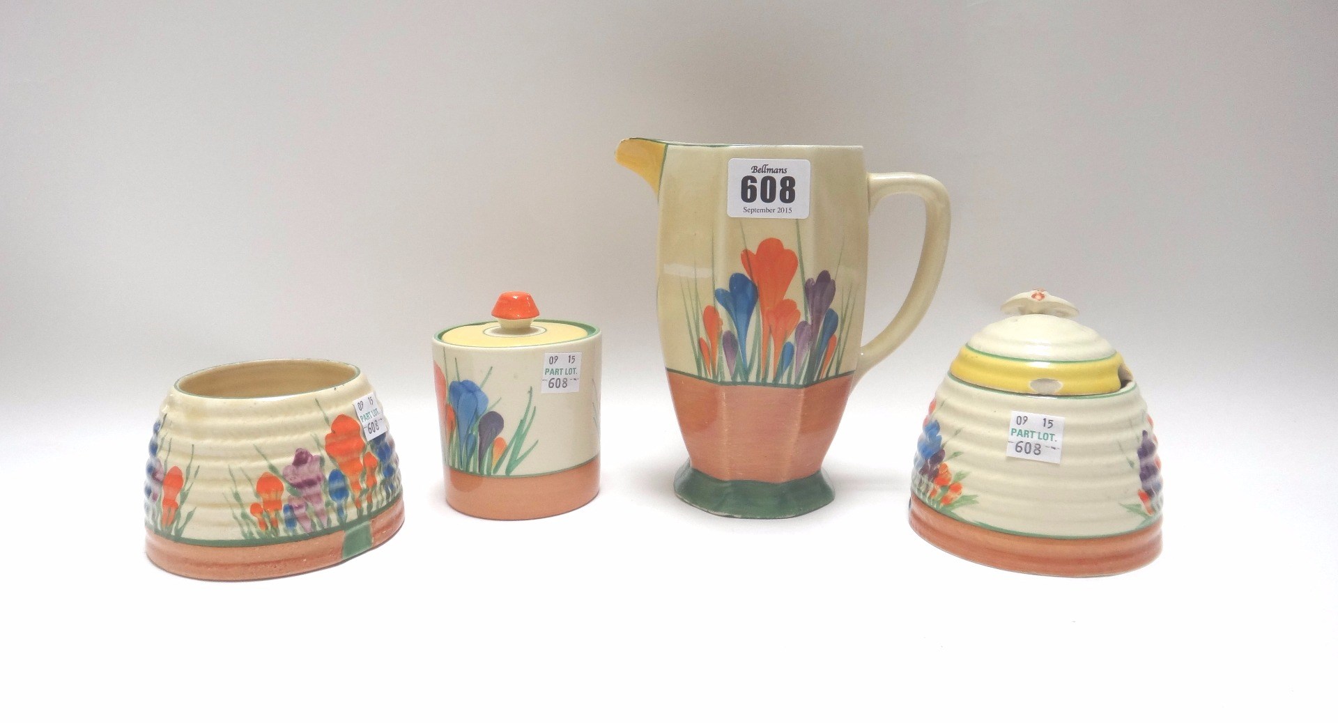 Appraisal: Four pieces of Clarice Cliff pottery decorated in the 'Crocus'