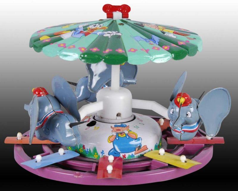 Appraisal: Linemar Dumbo Musical Carousel Toy Description Japanese Original box Circa