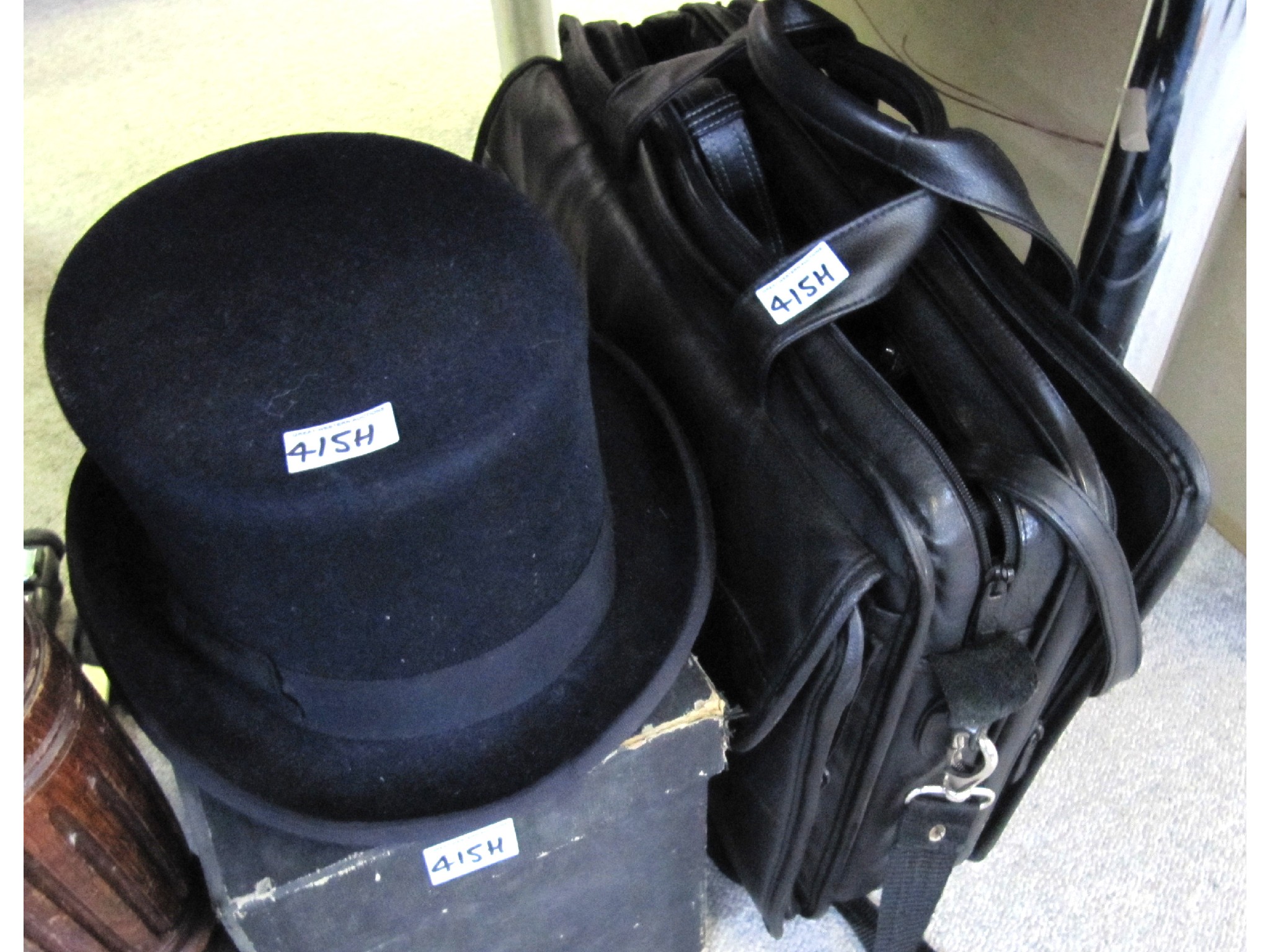 Appraisal: A lot comprising two top hats one in case and