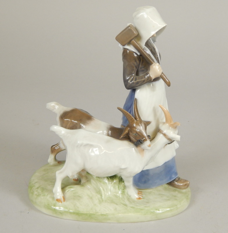 Appraisal: A Royal Copenhagen porcelain figure group in the form of