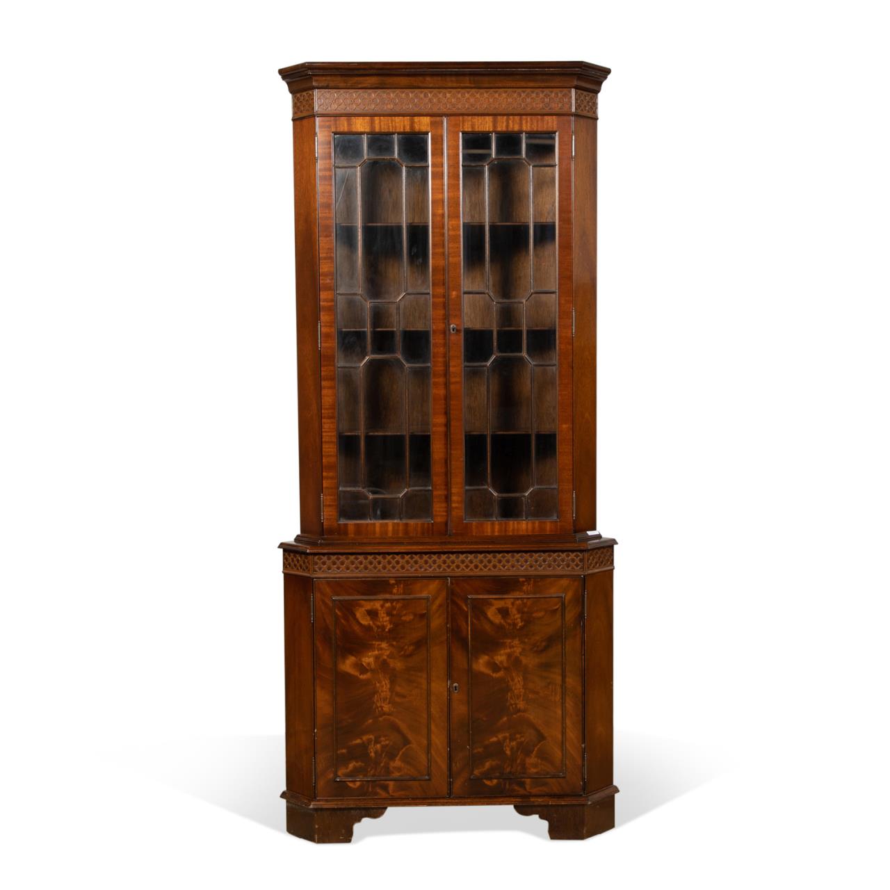 Appraisal: GEORGE III STYLE MAHOGANY GLAZED CORNER CABINET N Norman Limited