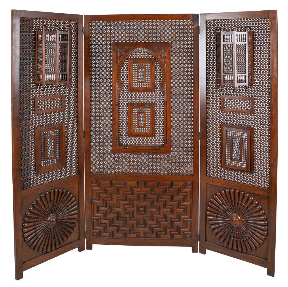 Appraisal: MOROCCAN STYLE THREE-FOLD CARVED HARDWOOD SCREENwith spindle panels brackets and