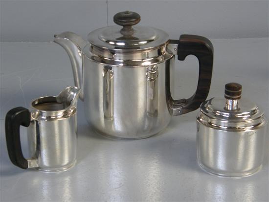 Appraisal: Dutch silver three piece round tea service with rosewood handles