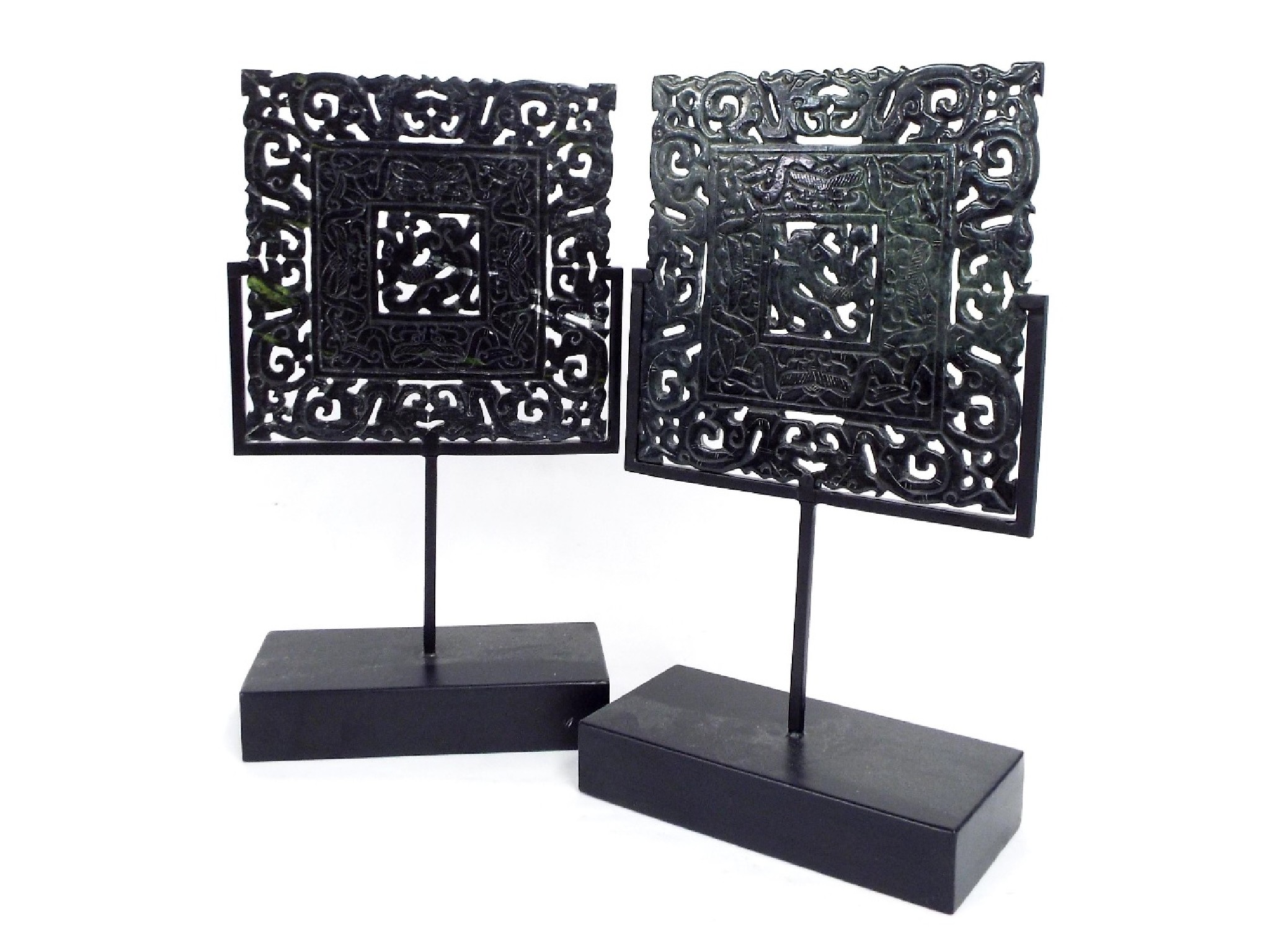 Appraisal: Pair of Chinese jade square carvings with various pierced trails