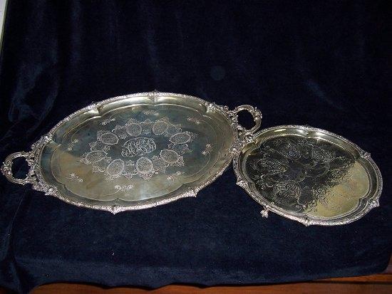 Appraisal: A two-handled oval tray with engraved monogram to centre cm