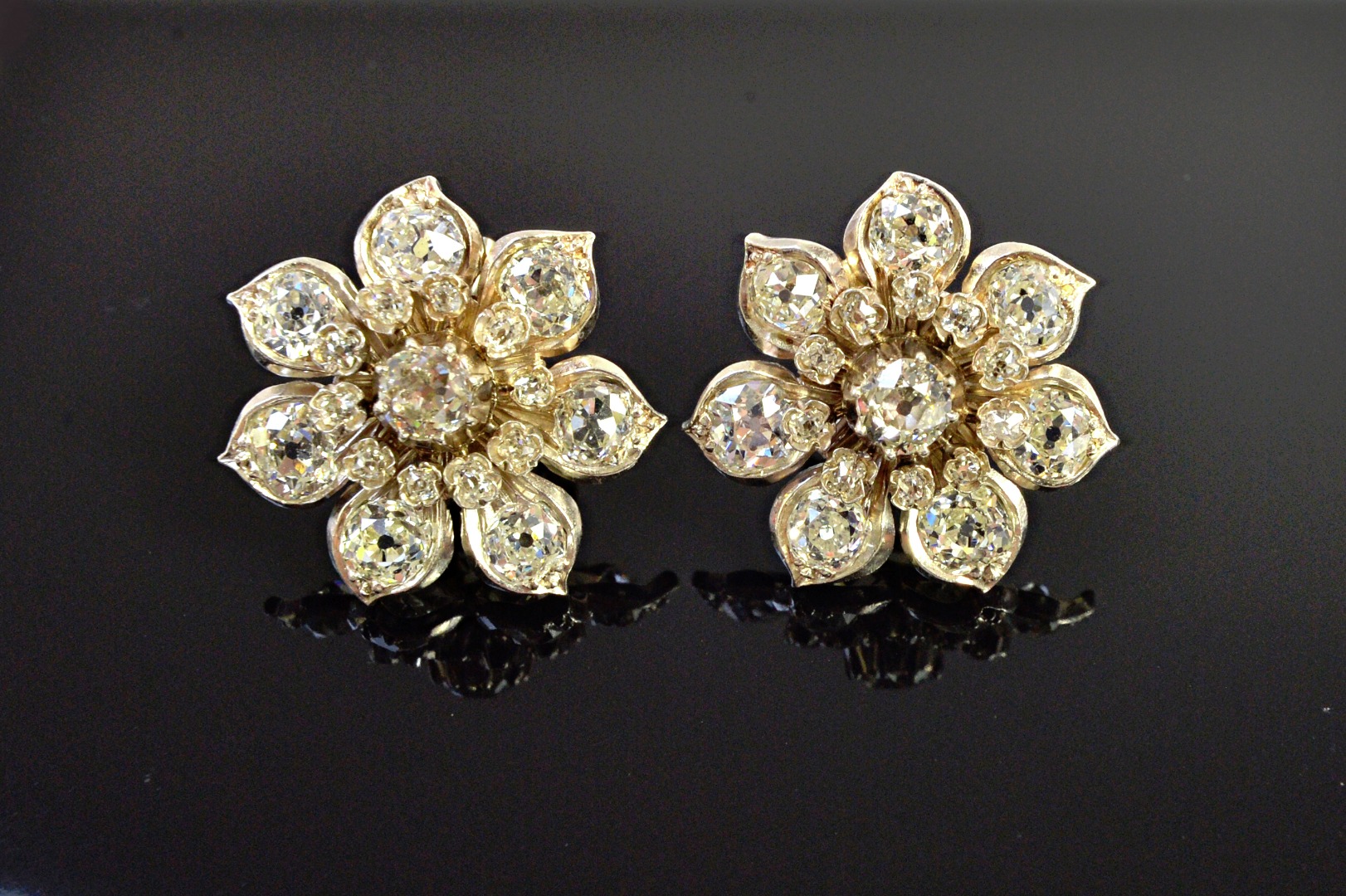 Appraisal: A pair of diamond set earclips each designed as a