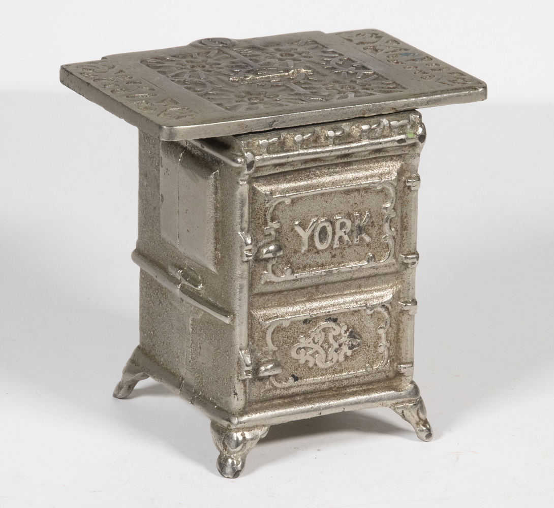 Appraisal: YORK STOVE STILL BANK Late th c Nickel Plated Cast