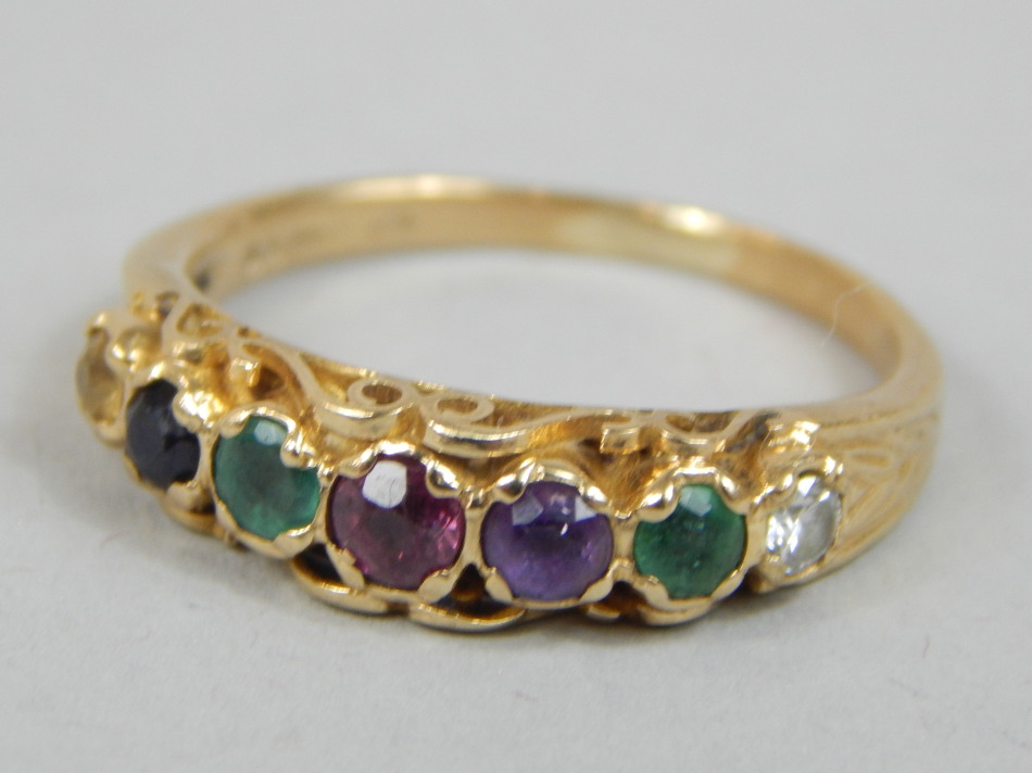 Appraisal: A ct gold dress ring set with seven coloured stones