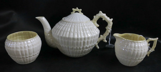 Appraisal: BELLEEK LIMPET TEA WARE SET three pieces each black Third