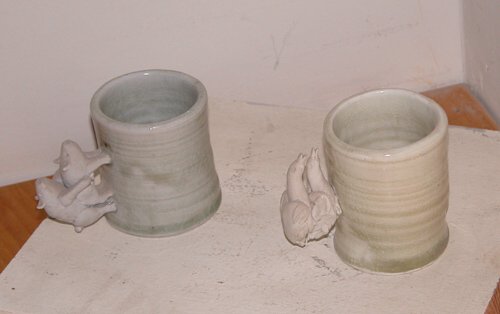 Appraisal: Two Copulating Handle Cups-geese and pigs Ceramic on Ceramic Lysohir