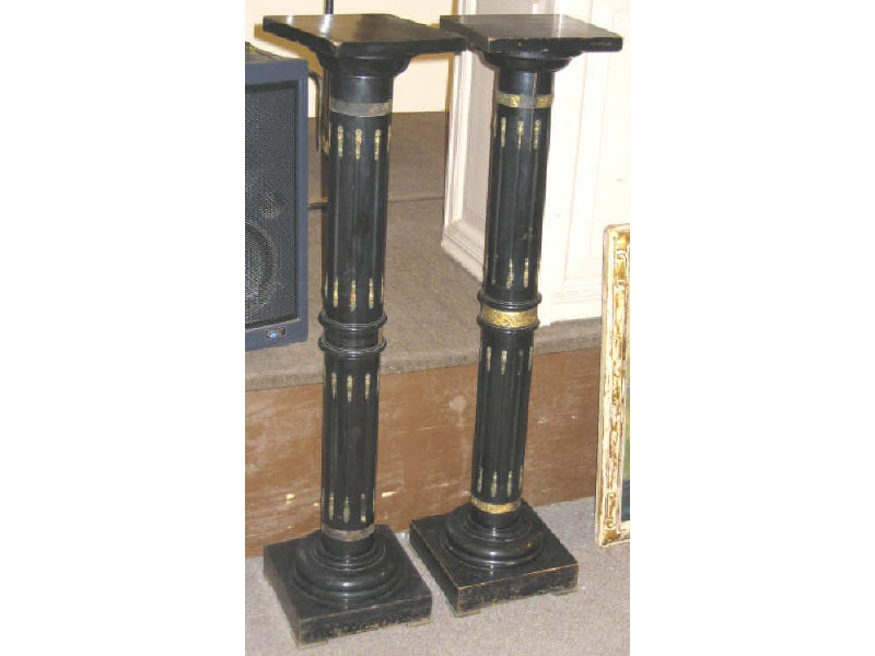 Appraisal: PAIR OF CONTINENTAL EBONIZED PEDESTALS Square tops rest above the