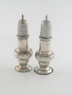 Appraisal: A near-pair of George III baluster casters with a stepped