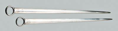 Appraisal: Two English silver skewers typical form both with family crest