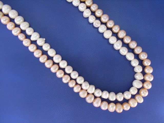 Appraisal: Two mm fresh water pearl suites including a necklace length