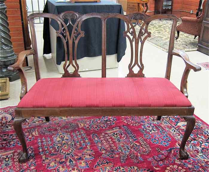 Appraisal: CHIPPENDAL REVIVAL MAHOGANY DOUBLE CHAIR-BACK SETTEE English early th century