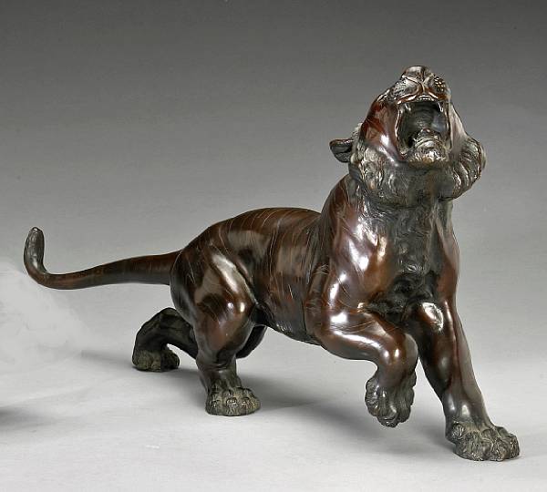 Appraisal: A large patinated bronze figure of a tiger Showa Period