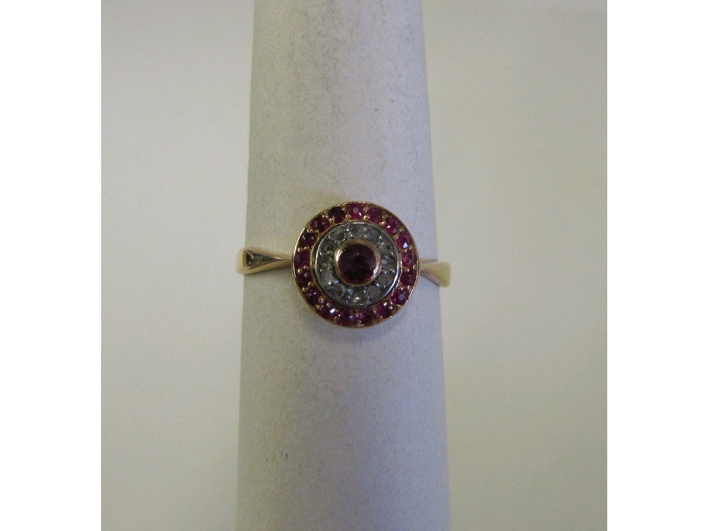 Appraisal: Edwardian ct gold ruby and diamond cluster ring