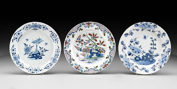 Appraisal: A group of three tin glazed earthenware plates th century