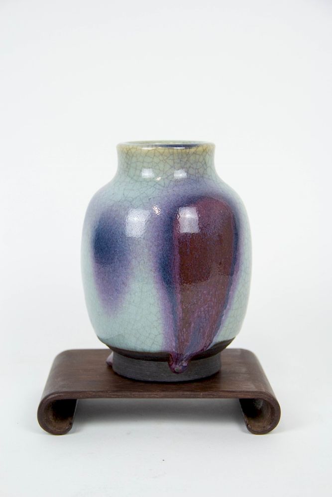 Appraisal: A Japanese Purple Splashed Junyao Vase The thick glaze crackling