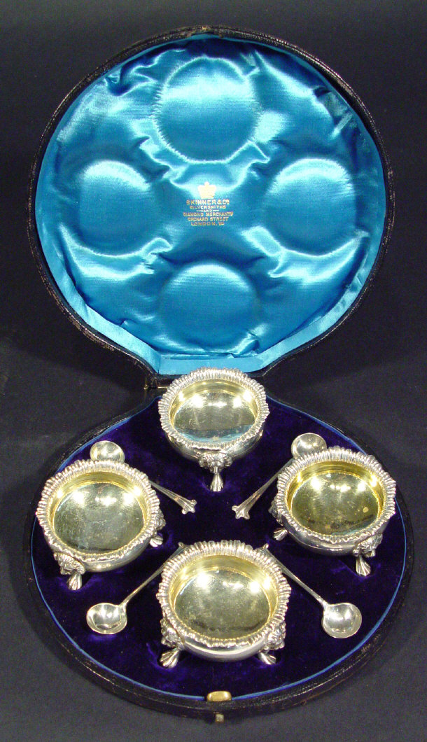 Appraisal: Set of four Edwardian circular salts each with three lion