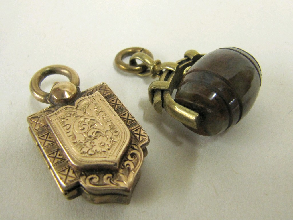 Appraisal: Rolled gold mounted agate barrel fob and a Victorian photo