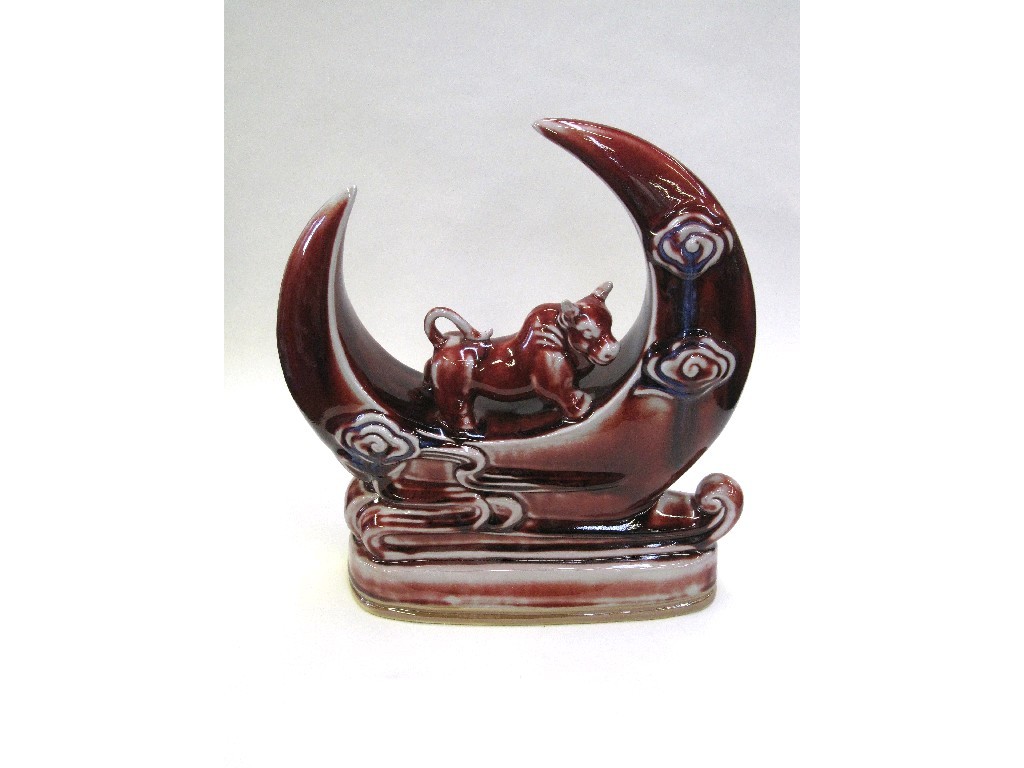 Appraisal: Oriental figure of a bull sat upon a crescent moon