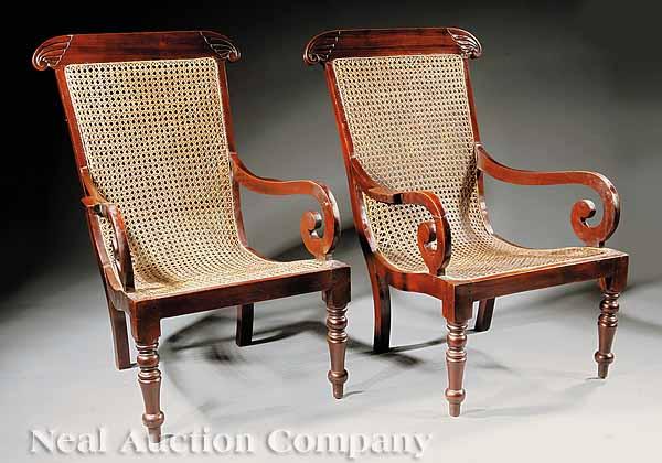 Appraisal: A Pair of Classical-Style Caribbean Carved Mahogany Chairs the crests