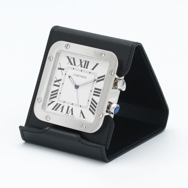 Appraisal: CARTIER TRAVEL ALARM CLOCK Stainless steel case and leather cover