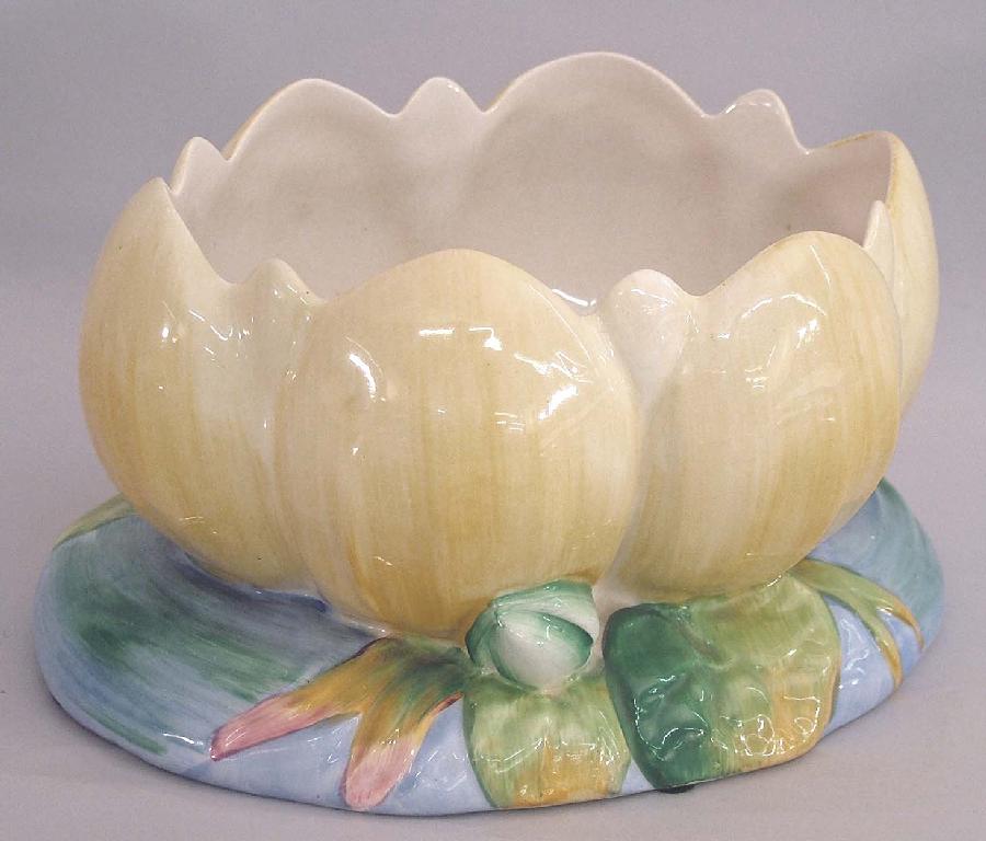 Appraisal: Oval lily pad jardiniere decorated in pastel shades shape wide