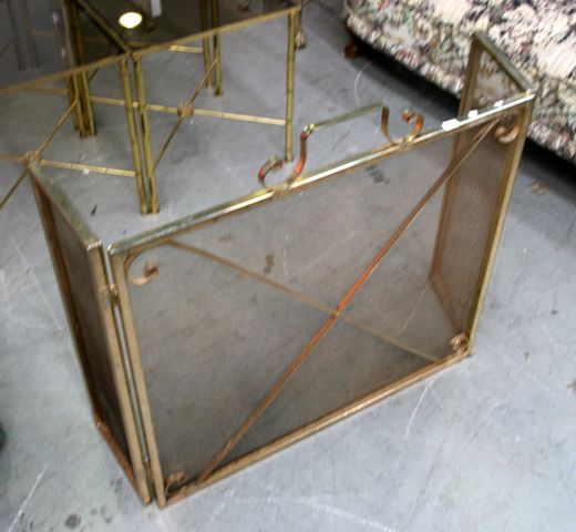 Appraisal: A brass fire screen