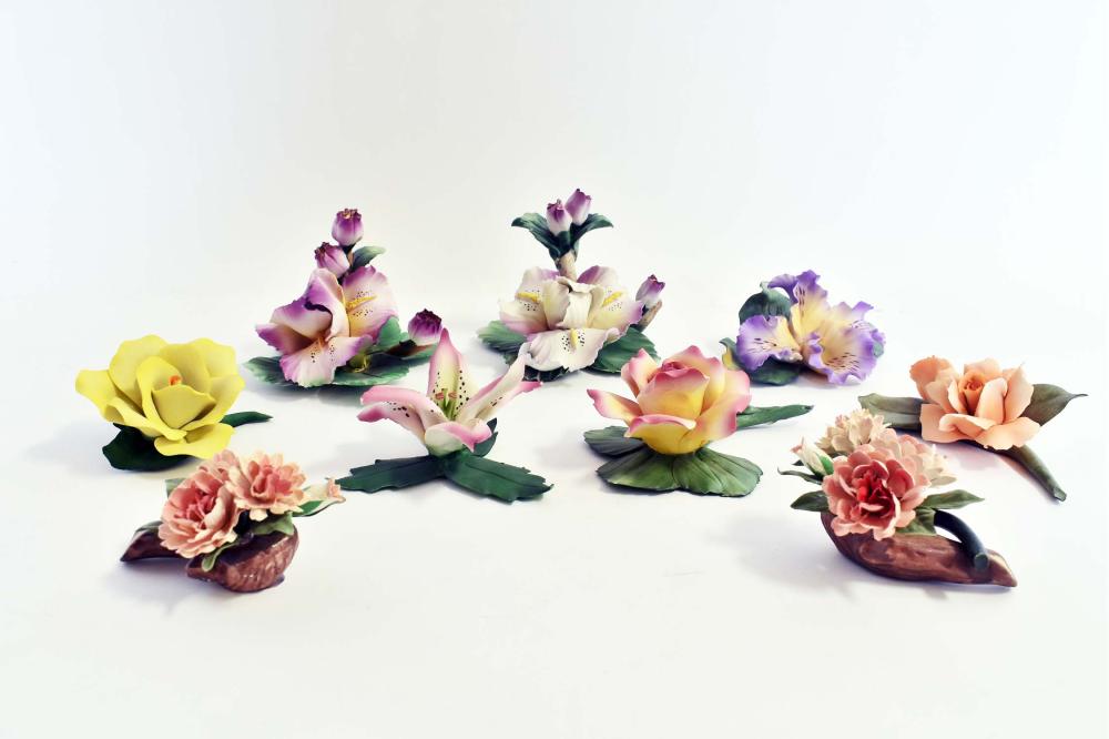 Appraisal: NINE CAPO DI MONTE PORCELAIN FLOWERSEach marked Modeled as orchids