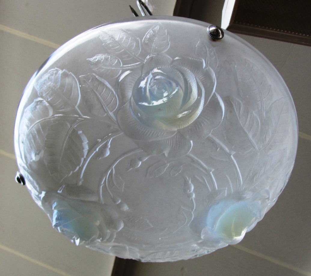 Appraisal: A set of four Lalique style clear and frosted glass