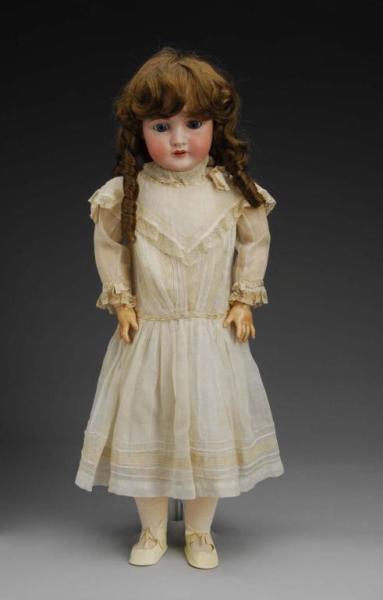 Appraisal: Kestner Child Doll Description Germany Ca Bisque socket head incised