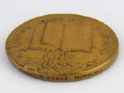 Appraisal: A bronze medal designed by F Bowcher cm dia