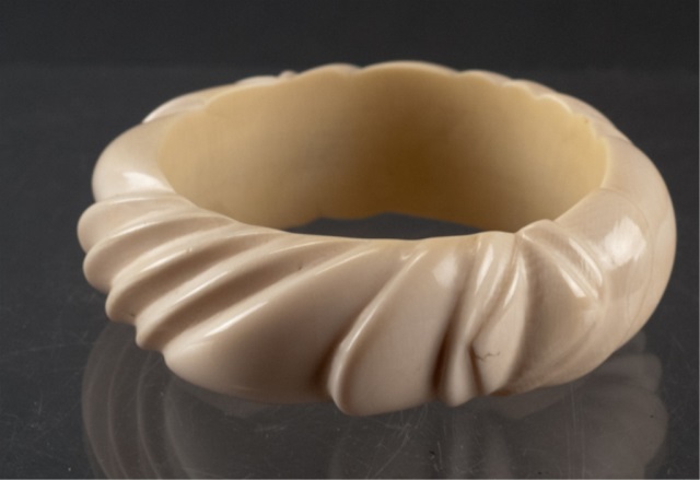 Appraisal: Carved Ivory Bangle Diameter grams