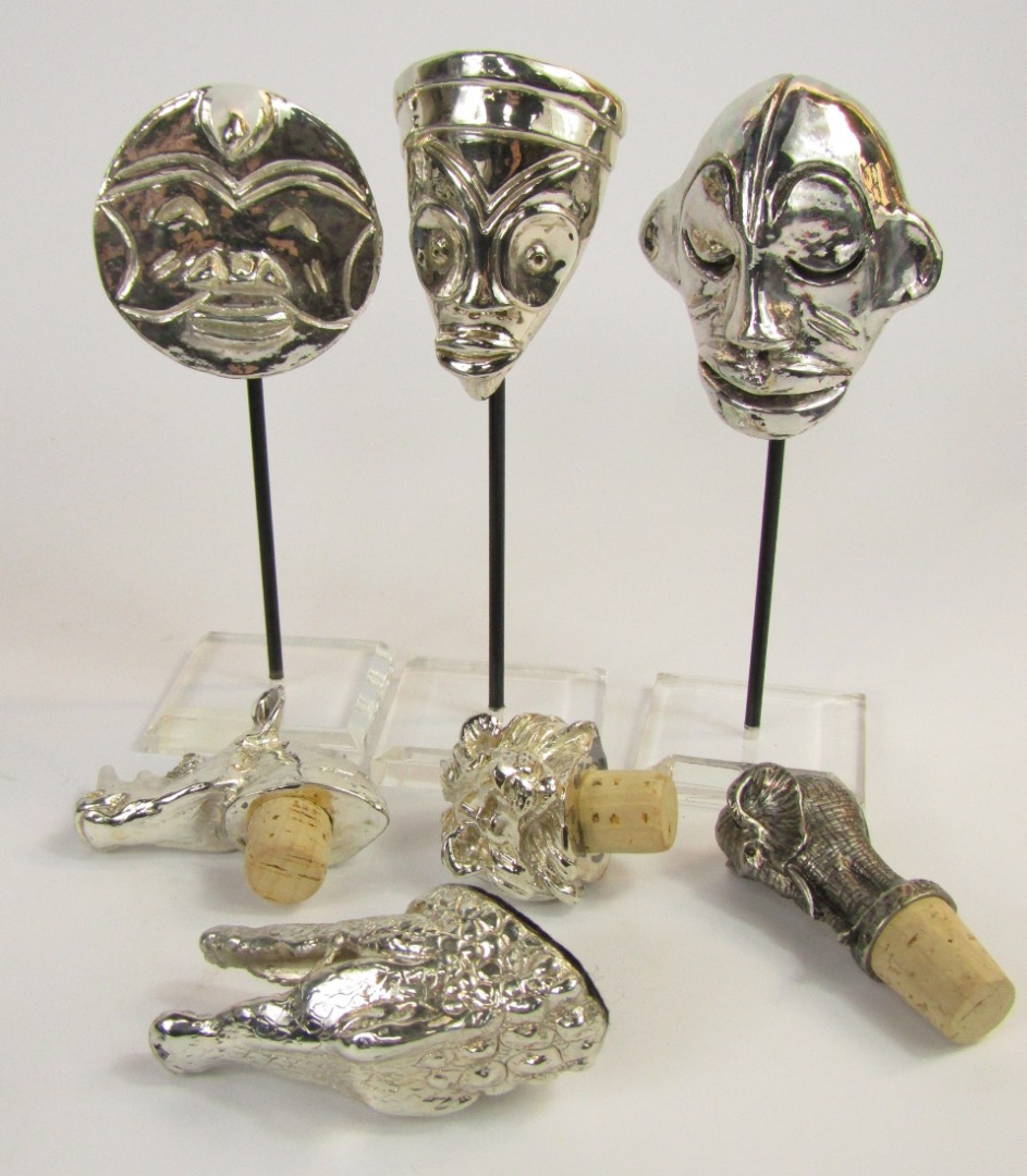 Appraisal: A group of Afrisilver plated items comprising lion's head rhino's