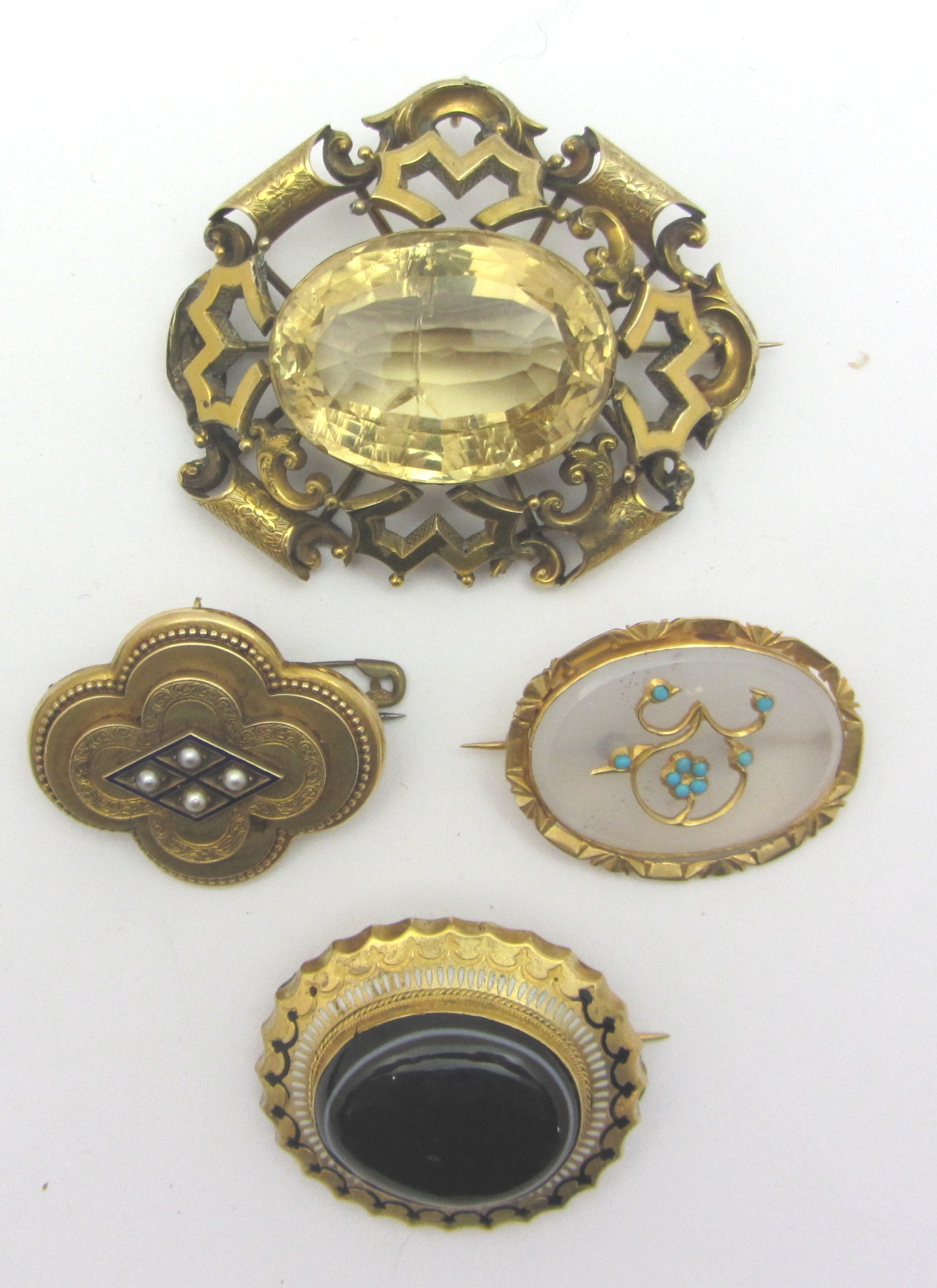 Appraisal: A Victorian citrine set single stone brooch mounted with a