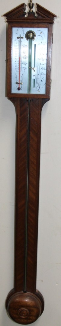 Appraisal: A George III style mahogany stick barometer the silvered dial