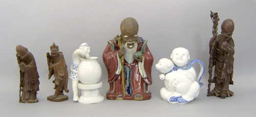 Appraisal: Six Chinese porcelain and wood figures h