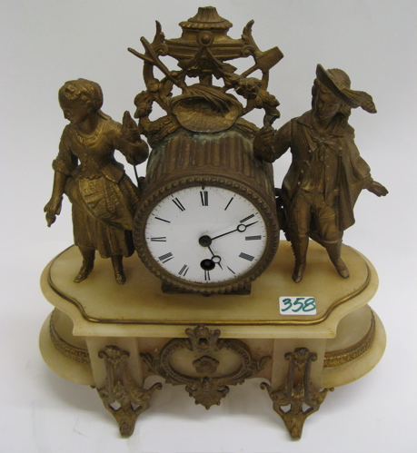 Appraisal: FRENCH GILT METAL SCULPTURE CLOCK The time only clock with