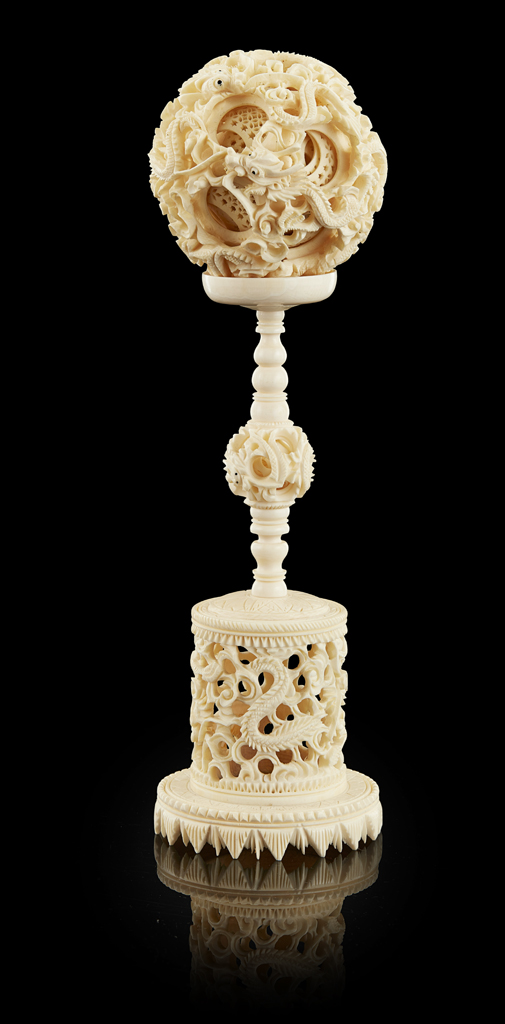 Appraisal: YCARVED IVORY PUZZLE BALL AND STAND LATE QING DYNASTY the