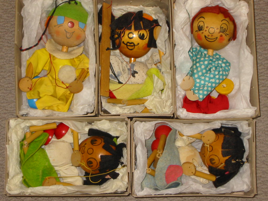 Appraisal: Five Pelham Jumpette puppets with wooden heads WH Boy three