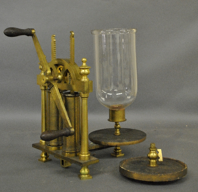 Appraisal: - Brass double barrel vacuum pump for scientific experiments signed